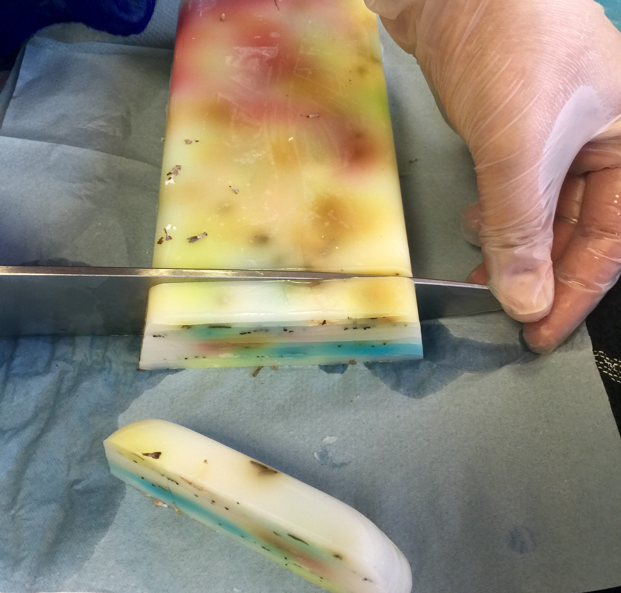 cutting the layered soap loaf