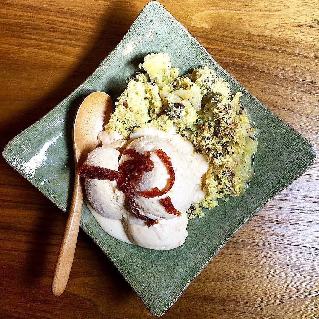 Quince and apple crumble with a polenta and pistachio crumble served with quince ice cream and membrillo slivers.