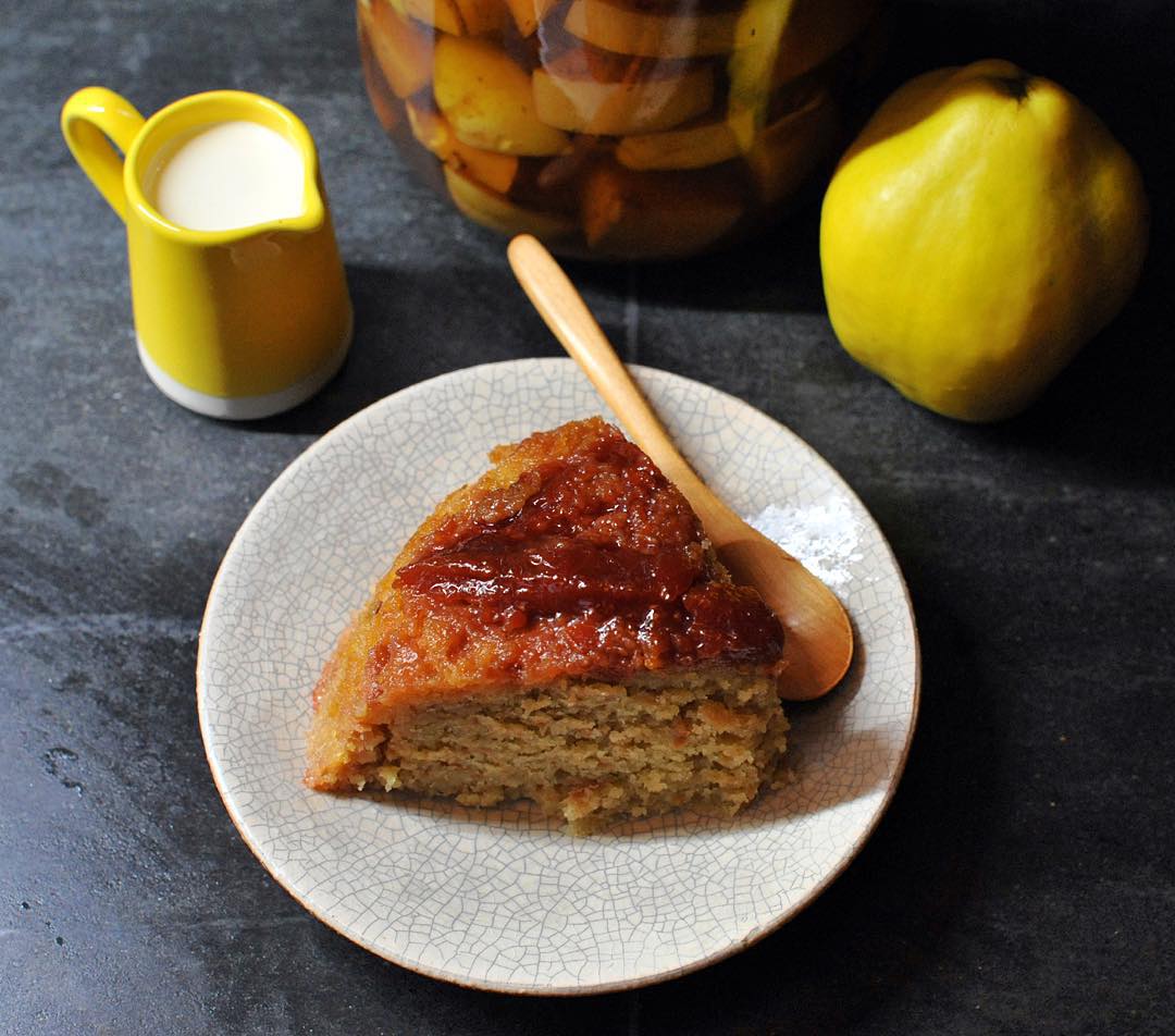 Quince steamed pudding served with cream and quince brandy.