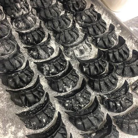 Chinese Laundry Squid ink jiaozi dumplings with pork, seaweed and Chinese chive (via IG @chinese_laundryroom )