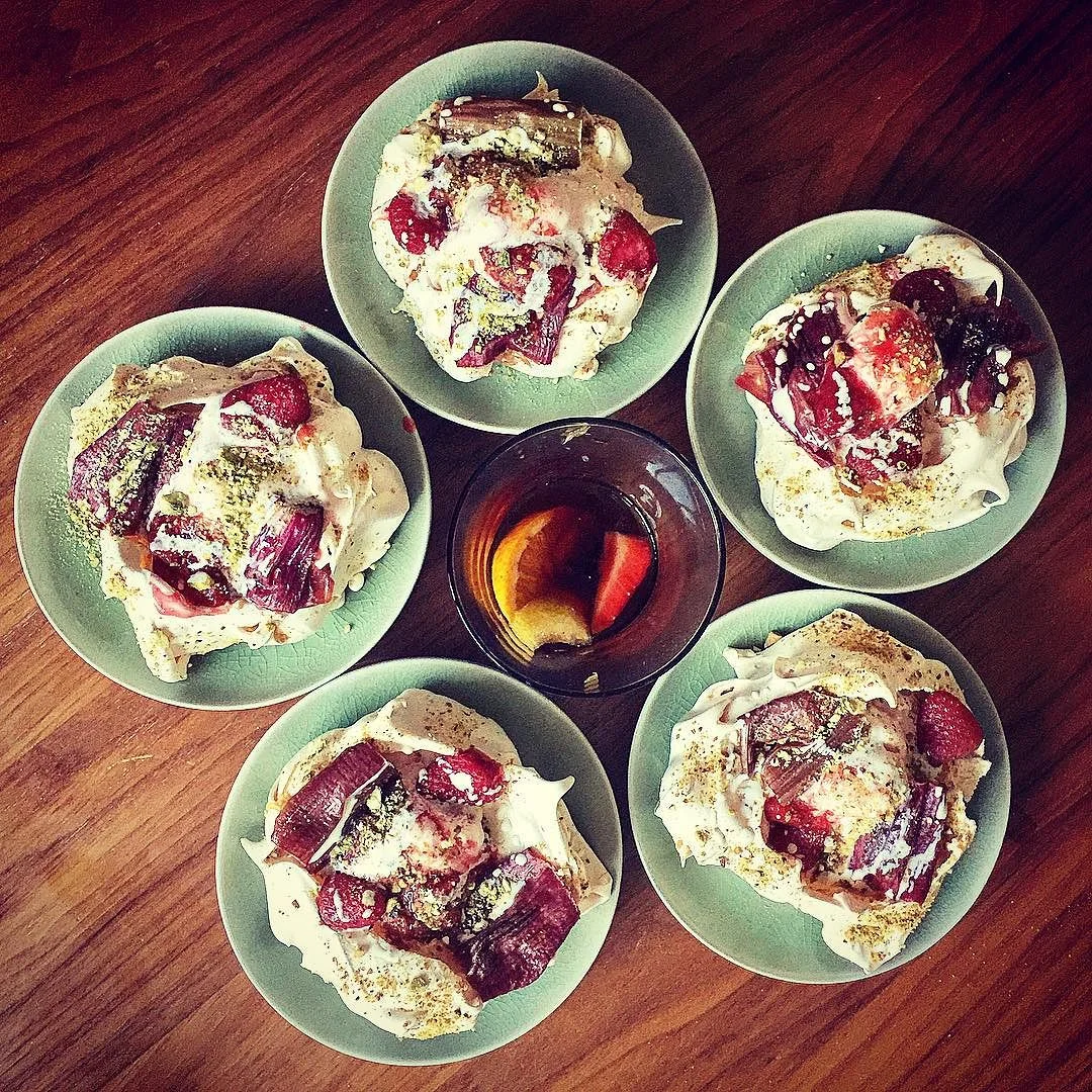 Smy Goodness Pudding: pistachio meringue with homemade strawberry and roasted rhubarb ice cream topped with roasted rhubarb and strawberries with lashings of cream and toasted pistachios. IG: @SmyGoodness