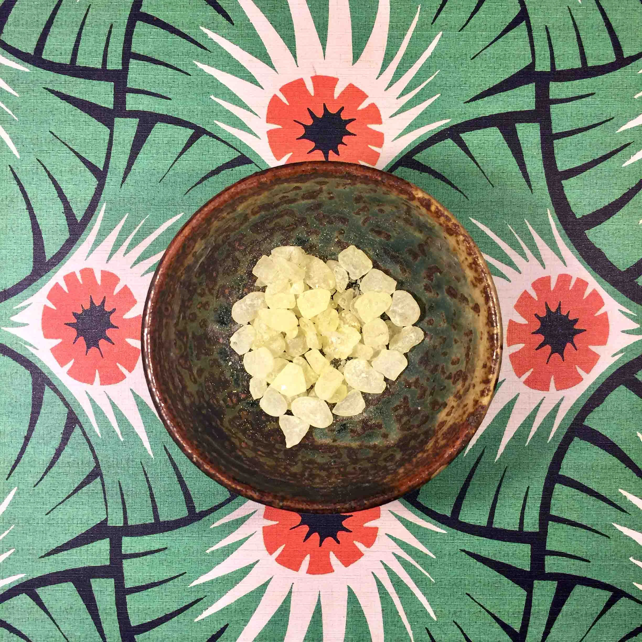 Tears of Chios, mastic, mastiha - in saucer by potter Hadrian Mendoza and on Pattern Design book by Elisabeth Wilhide