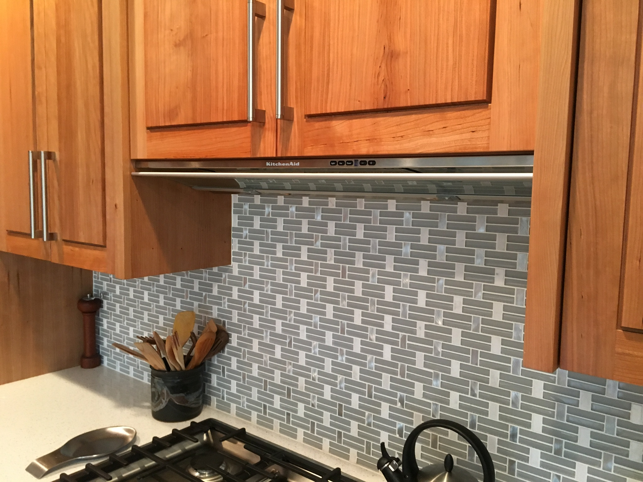 Cabinet detail with range hood, quartersawn cherry