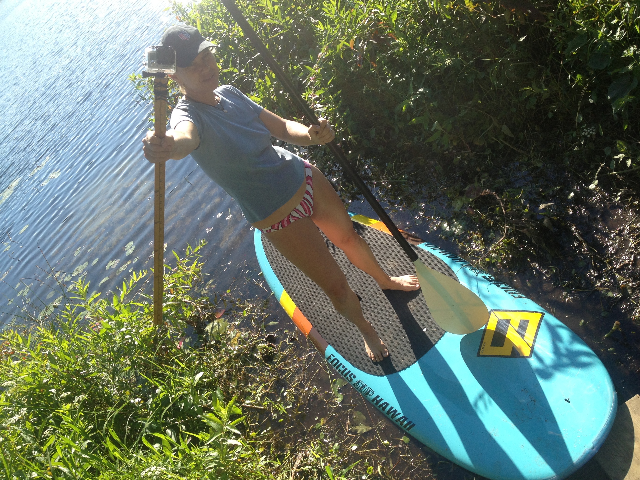  Madeleine on paddle board with Go Pro on a stick for Crystal Lake shoot 