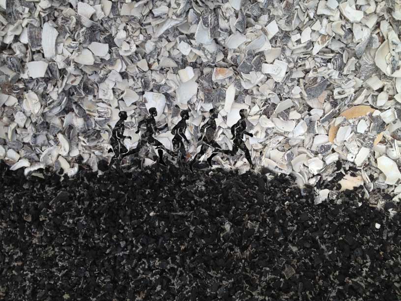 Shredded Rubber Runners in shell landscape.