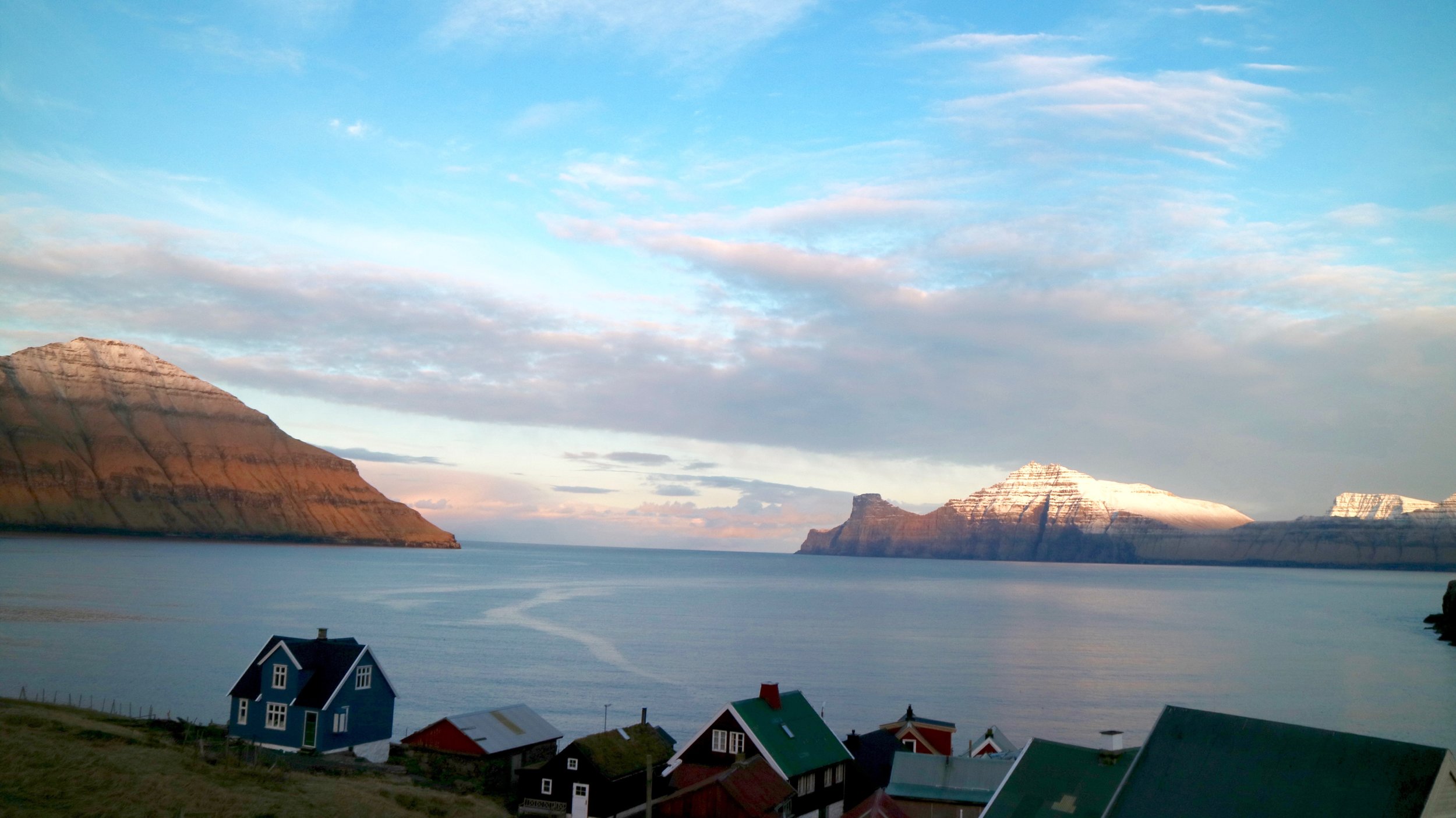 That very special light ... our bay. Picture above: The road that leads to our village on Eysturoy