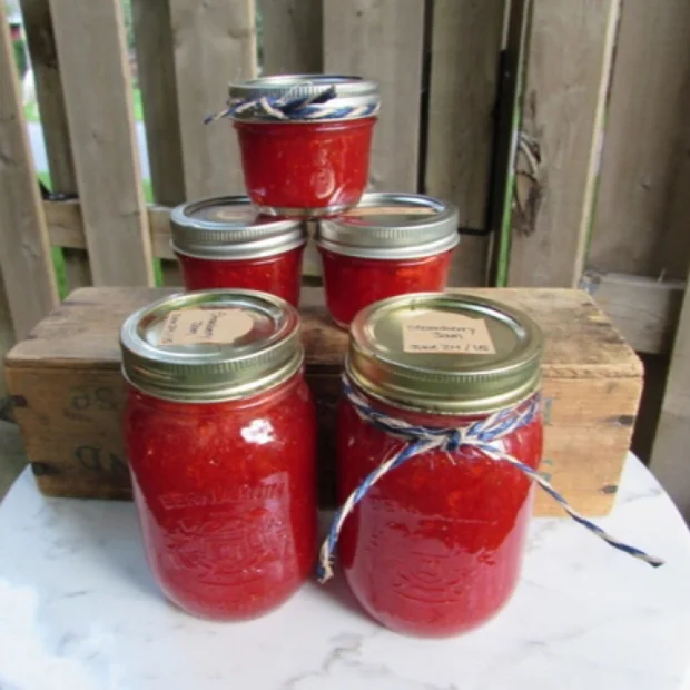 Turning strawberries into jam. Check out the recipe here . 