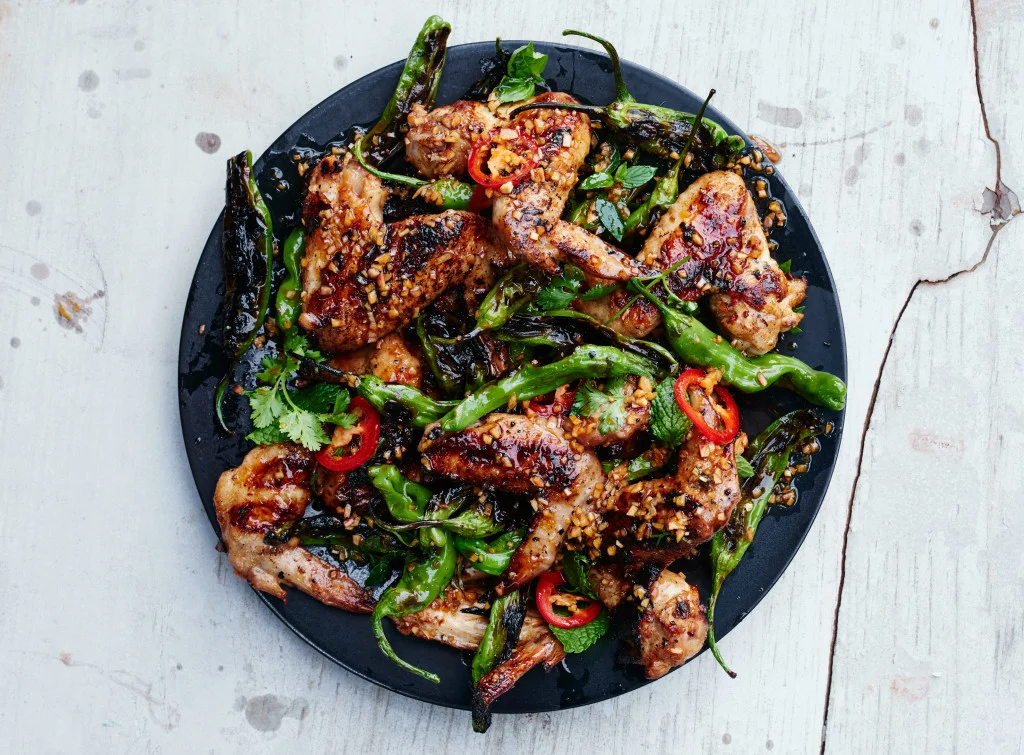 grilled-chicken-wings-with-shishito-peppers-and-herbs-1024x755.jpg