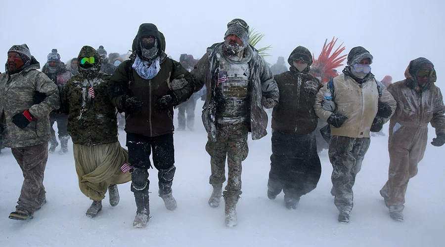 Army veterans forming human shield to protect NoDAPL protesters at Standing Rock, North Dakota,&nbsp;2016.