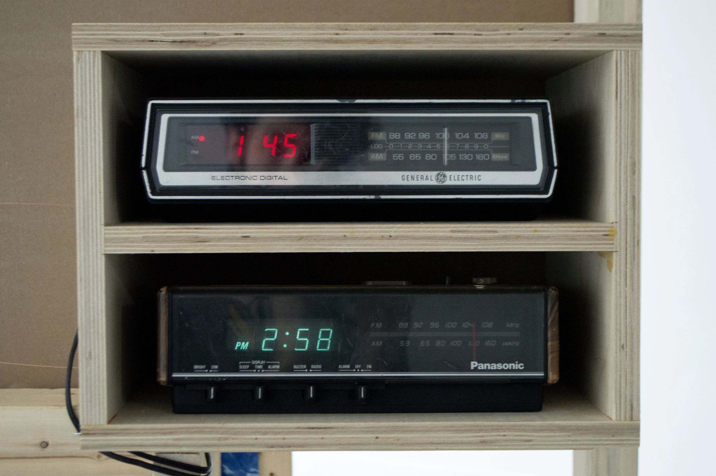 Seer 2018, Vinyl pool liner, pine, drywall, lights, metronome, radio alarm clocks, ash log, steel, window screens, lightning rod