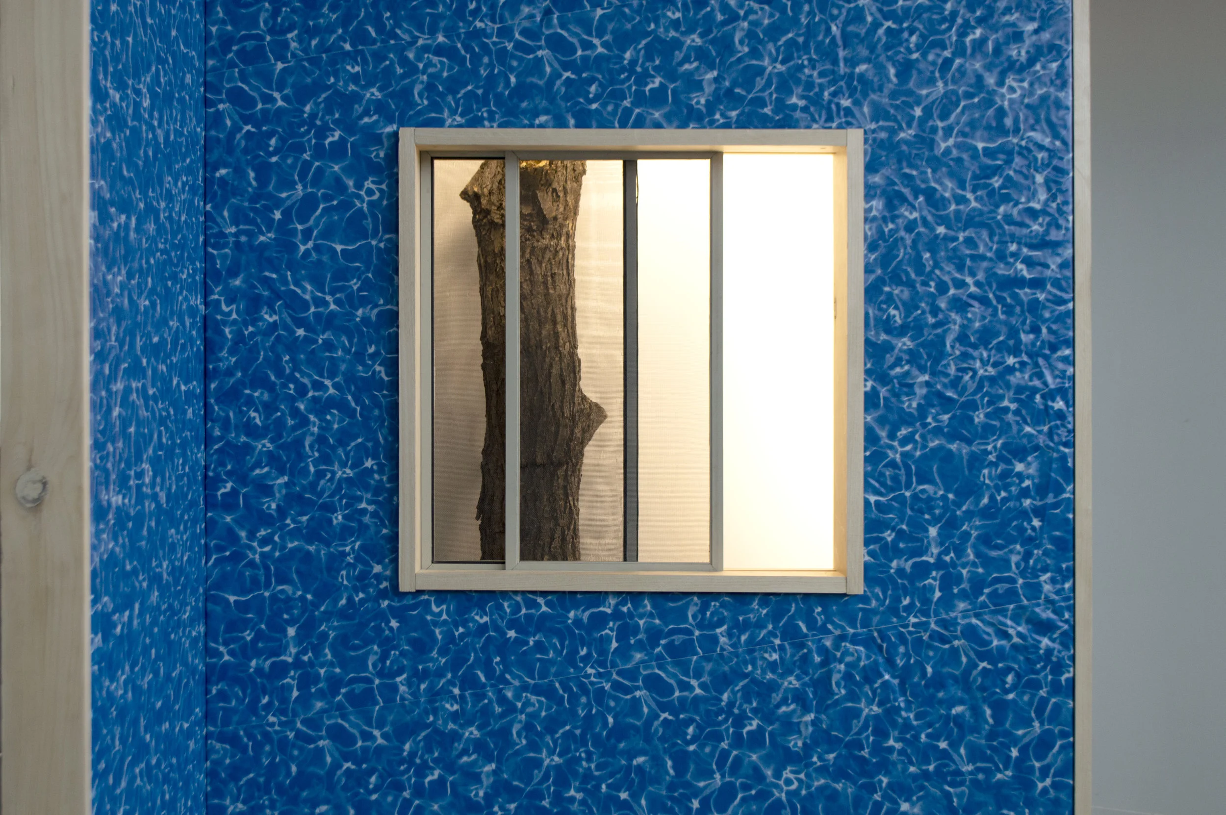 Seer 2018, Vinyl pool liner, pine, drywall, lights, metronome, radio alarm clocks, ash log, steel, window screens, lightning rod
