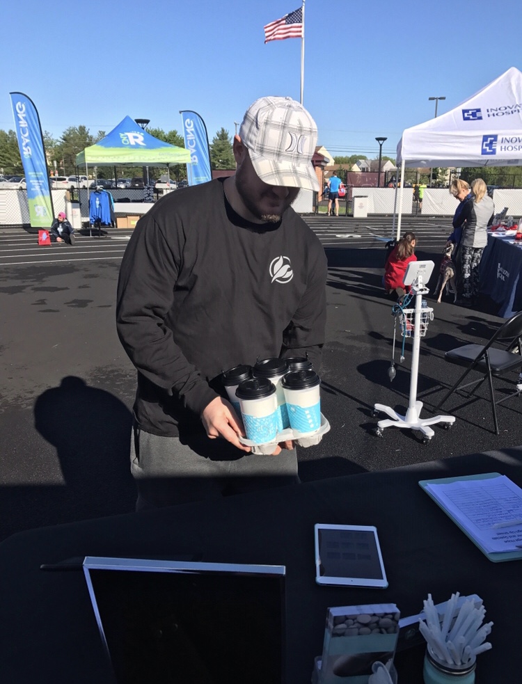 Our fearless leader returning with our coffee