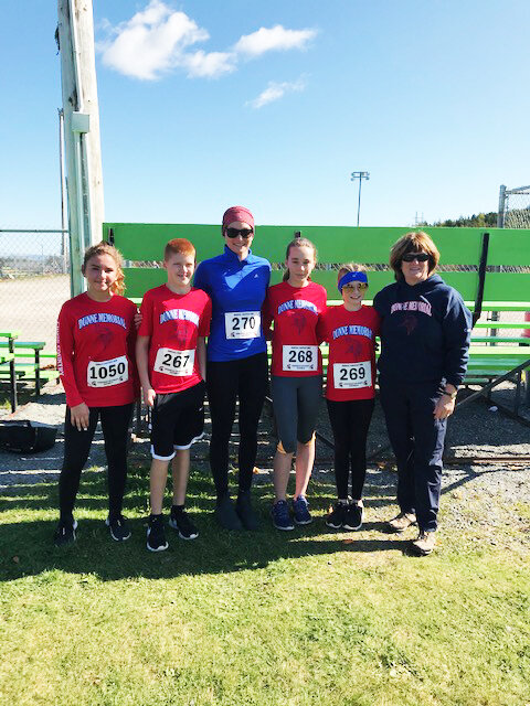 Dunne Academy may not have a big enrolment, but its student body has a lot of spirit as evidenced at the recent Harvest Run held in Carbonear. Among Dunne’s running team who took part in the races are, from left: Claire Ryan (placed eleventh in grade six level), Kaine Tobin (placed seventh in Grade five level), Megan Squires (placed first in Grade 11 level), Savannah Hynes (placed tenth in Grade seven level), Heather Squires (placed twelfth in Grade seven level) and coach Karen Hearn. Missing from the photo is Grade three student Noah Van De Bulk, who placed seventh out of 162 runners in his grade level. Submitted photo