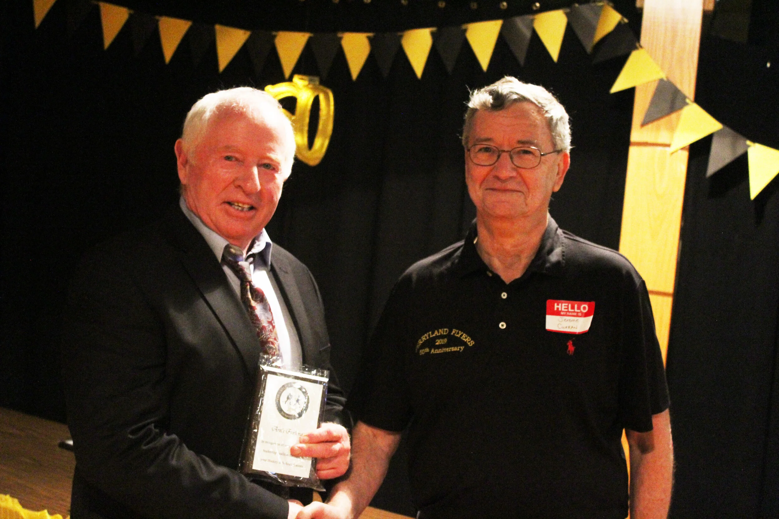  Arnie Furlong receiving his Most Consistent award from Jerome Curran. Both Furlong and Curran were among the 19 who received appreciation awards. 