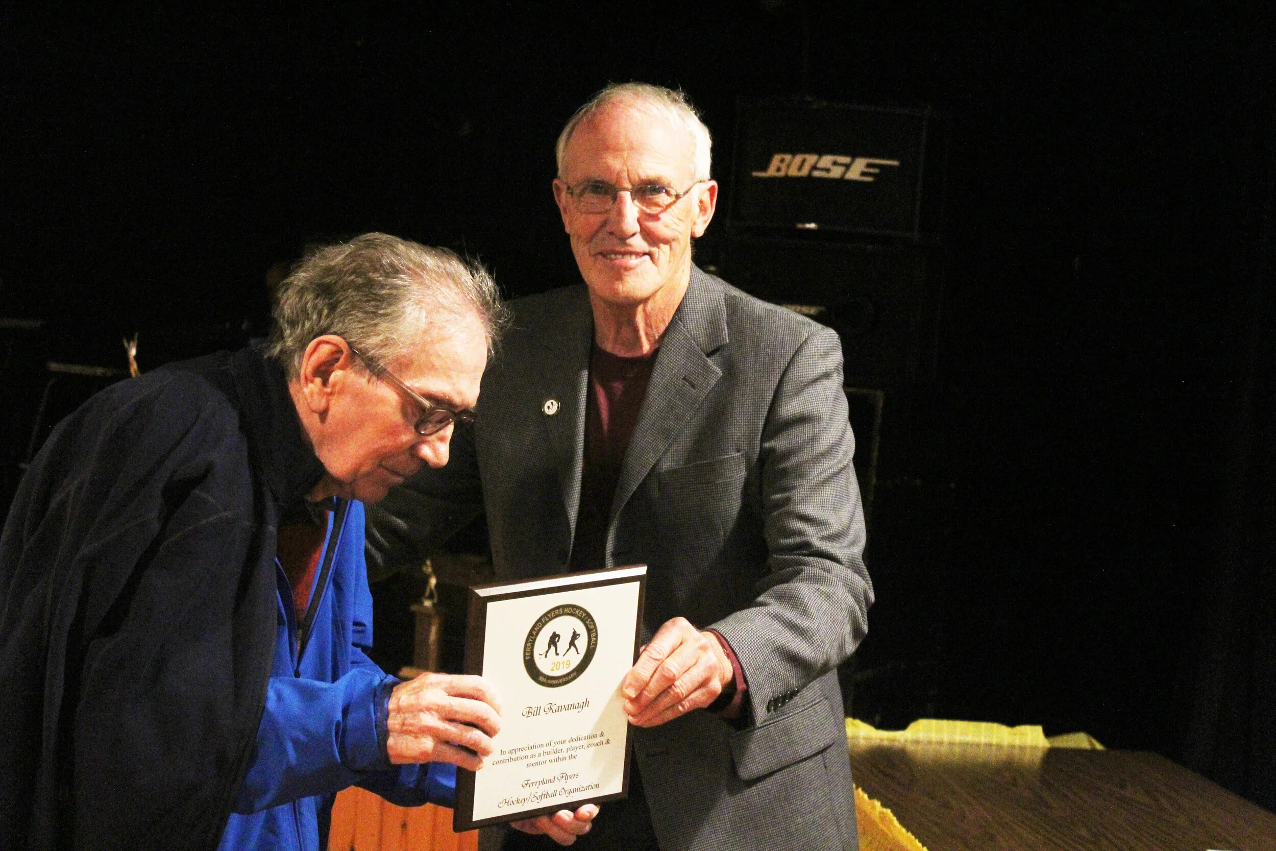  Bill Kavanagh here receiving the prestigious top award for his role as player, coach, builder, and mentor. He is receiving the award from Johnny Seay. Kavanagh also received one of the 19 appreciation awards. 