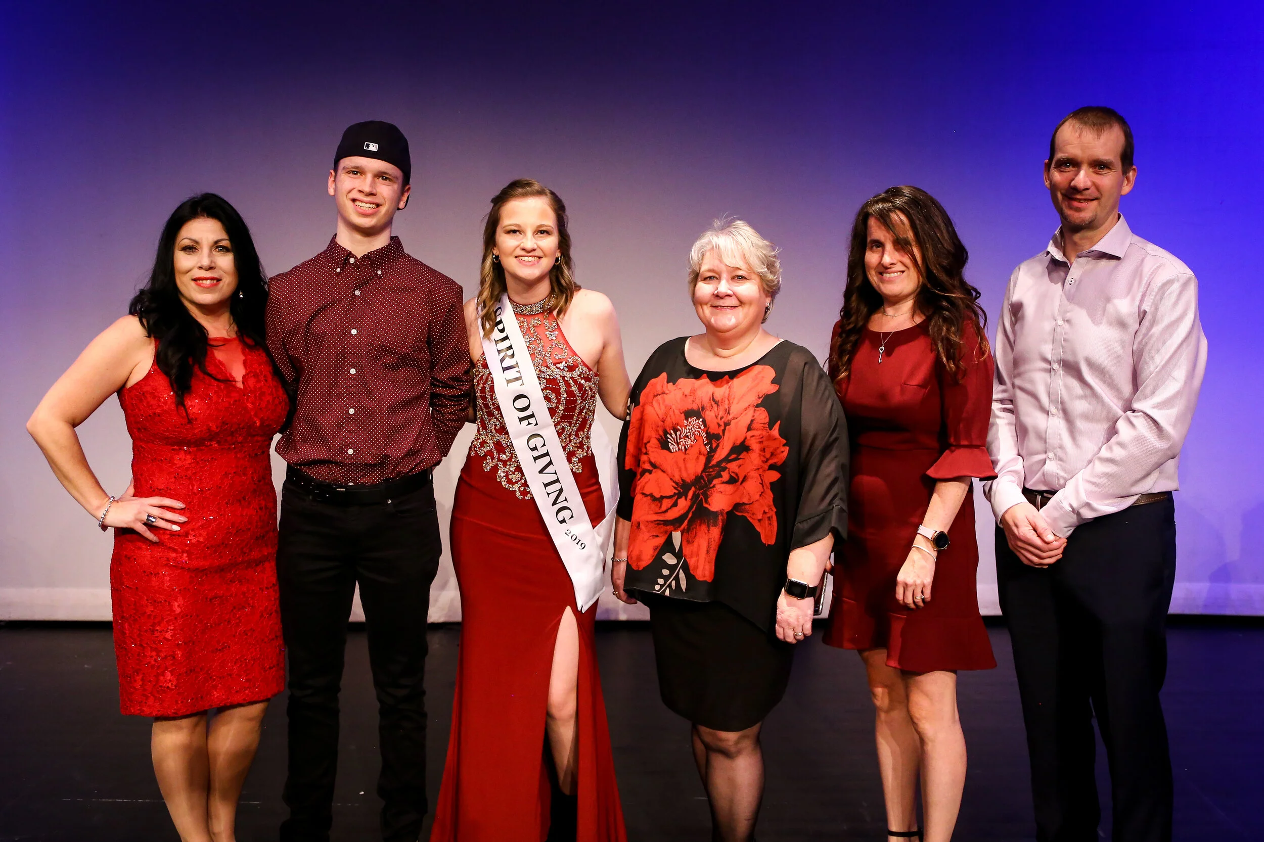  Kaitlyn Boyle,17, of Goulds, was the 2019 Isabella Ashley Spirit of Giving Award Winner at this year’s Miss Achievement event. She raised over $2,000 for Ronald McDonald House NL. The contestants raised a total of $18,500 for the charity, which gives families a place to stay while their children receive medical care. The Skinner family of Massey Drive, who have been guests at the St. John’s Ronald McDonald House since July, were on hand for the awards gala. From left are Christine Morgan of RMHC NL, Joshua Skinner, Kaitlyn Boyle, Annette Godsell of RMHC, Krista Skinner, and Brian Skinner. Photo courtesy of Ben J. King Photography. 
