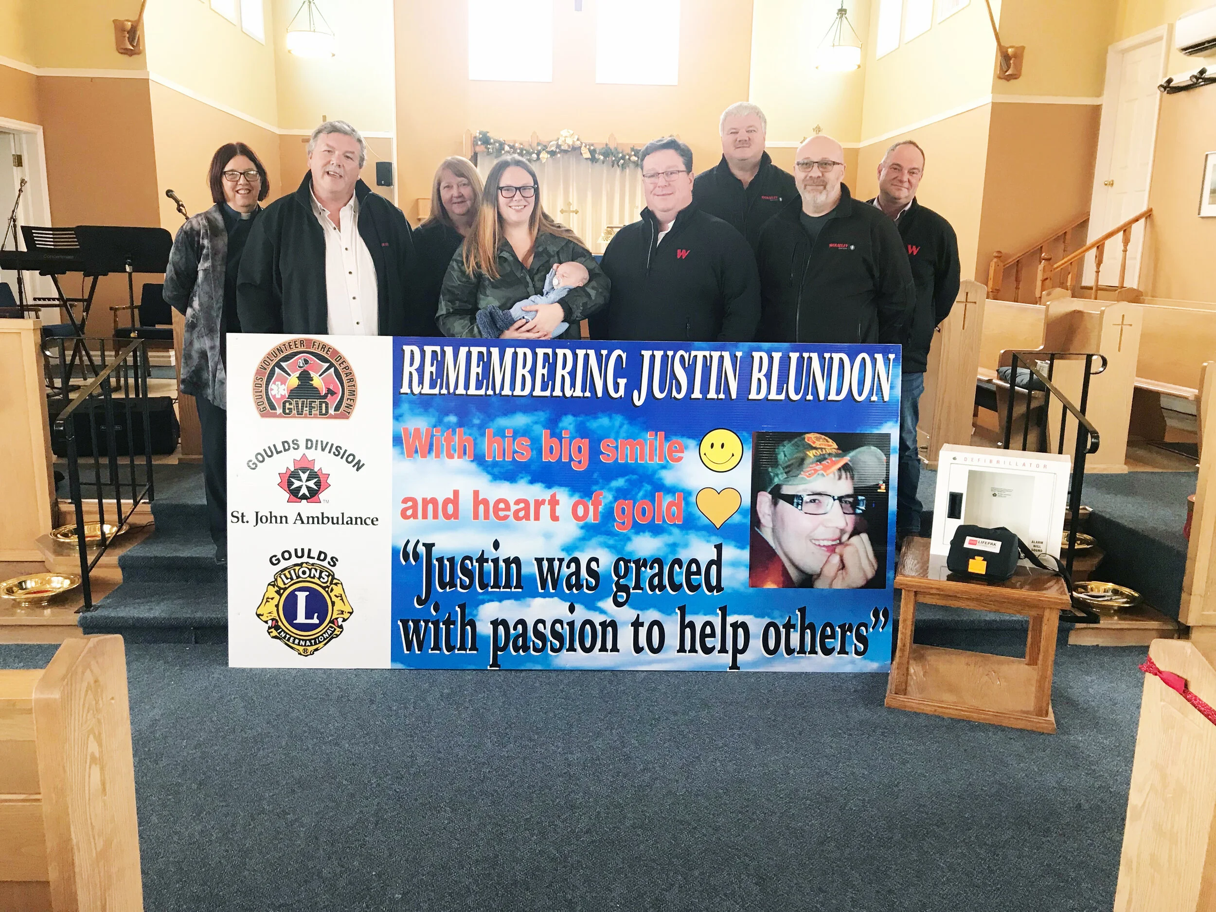  On hand for the donation of an automated external defibrillator to St. Paul’s Church in the Goulds were, from left: Reverend Sandra Tilley, Chris Blundon, Linda Blundon, Janean Blundon, William Blundon, and Kirk Stokes, Keith Wrice, Colin Parson and Don Antle of Wolselyey Waterworks. The donation was made in memory of well-known Goulds volunteer Justin Blundon, who passed away last February because of heart complications.   