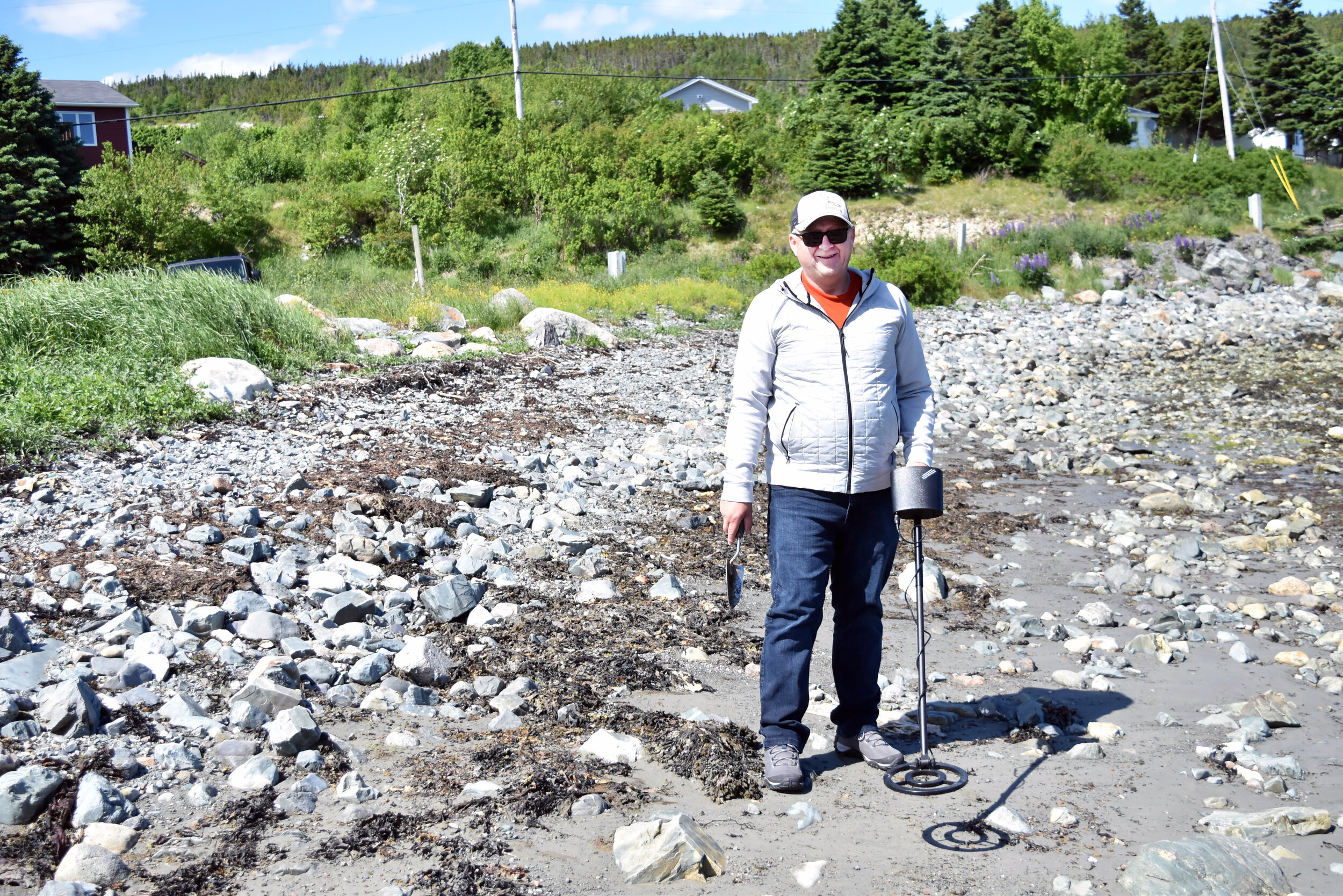  Goulds detectorist Peter Pierce with his metal detector on Cape Broyle beach earlier this summer.  All he found that day was some old screws and nails.  He found a Newfoundland coin dated 1912 in the ground at Pippy Park. 