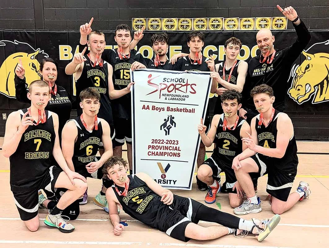  The Southern Shore’s Baltimore Broncos are provincial champions after winning the AA Boys Basketball tournament this past weekend at their home gym in Ferryland. In the back row, from left to right, are: coach Wendy Walsh, Kegan Goodridge, Nathan Crane, Ashton Crane, Carter Coady, Jeremiah Ryan, and coach Liam Walsh; in the front, from left, are: Zachary Ryan, Nathaniel Walsh, William Carey, Cameron Shannahan, and Landon Reddy. Submitted photo. 