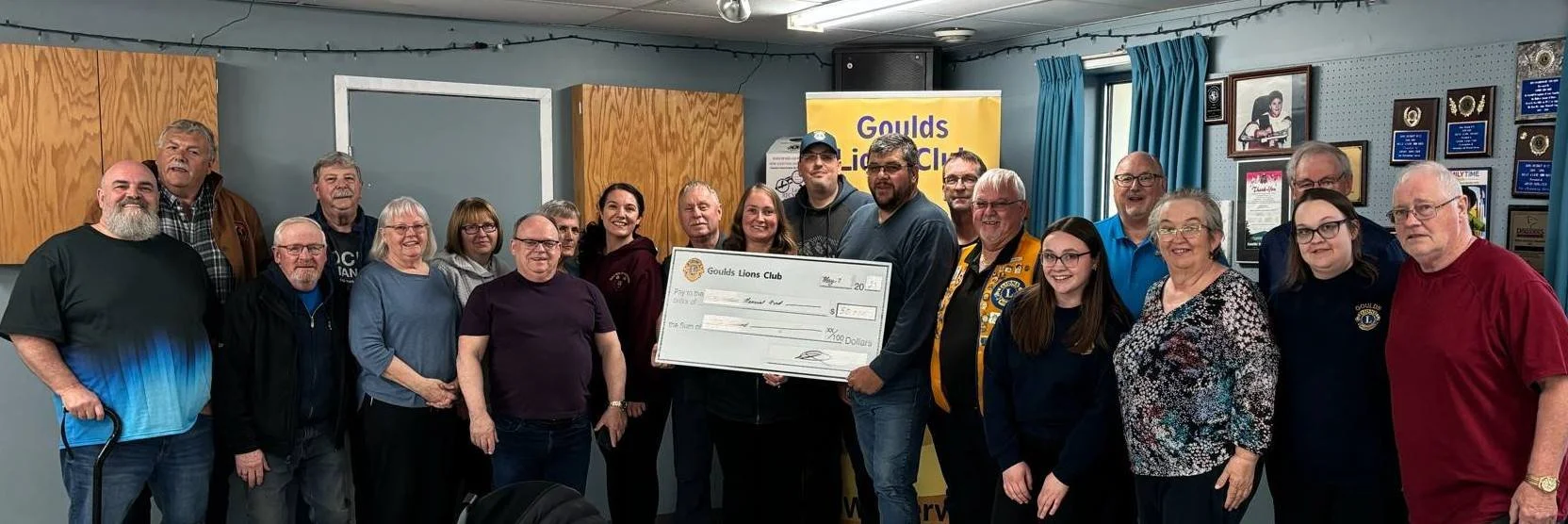  The Goulds Lions Club donated $50,000 to the Curtis Hudson Memorial Fund earlier this month. The fund strives to honour the memory of Curtis Hudson, 6, of the Goulds, who passed in 2017 after a courageous battle with cancer. The money will be put towards construction of a state of the art playground at Goulds Elementary in honour of Hudson. In the back, from left, are Chris Blundon, Patrick Putt, Cindy Vickers, Maureen Hynes, Krista Finn, Wayne St. Croix, Jamie Finn, Jim Chafe, Derrick Rideout, and Clev Ingram. In the front, from left, are Roy Abbott, Bill Ryan, Barbara Hearn, Charlie Phillips, Curtis’ mother Krista Hudson, Dave Oake, Carl Chafe, Peggy Kinsella, Marlene Chafe, Emily Chafe, and Aiden Hynes. Goulds Lion Club Photo 