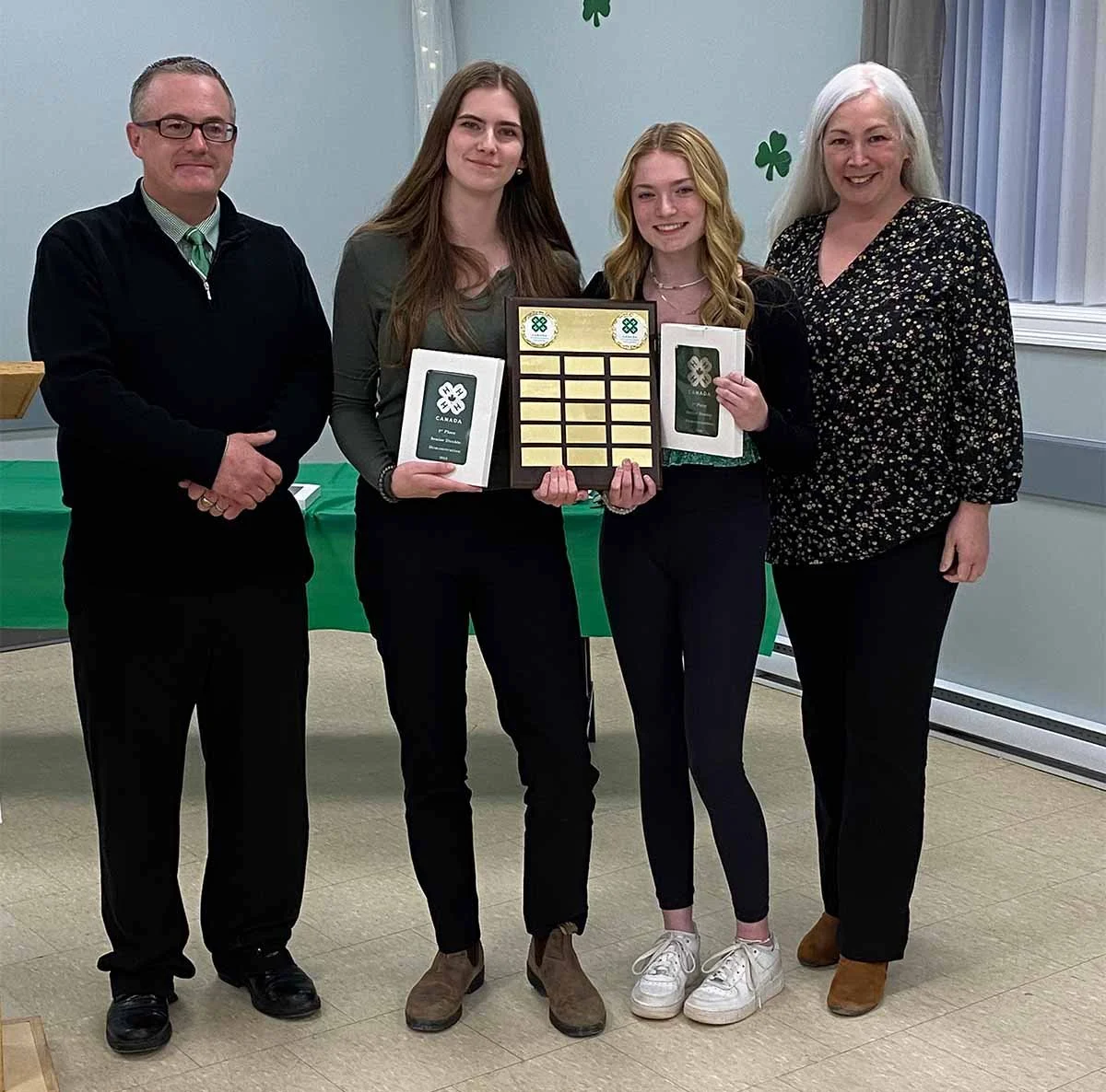  Amy Bishop of Dunne Academy was one of 15 recipients of the provincial government’s 2023 Safe, Caring and Inclusive Schools Leadership Bursary. Pictured is Bishop, along with Heather Squires, being recognised by 4H Canada for successful provincial demonstrations. From left to right is Summerside Rockets 4H Club coordinator Clifford Bursey, Amy Bishop, Heather Squires, and Nancy Murphy, who is chairperson of 4H Newfoundland and Labrador. Submitted photo 
