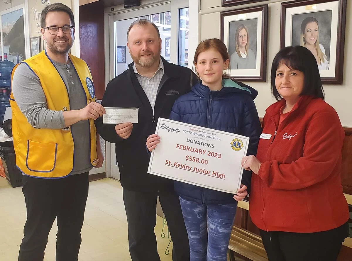 The Goulds Lions Club has undertaken a 50/50 ticket fundraiser in conjunction with Bidgood’s Supermarket to raise money for local causes. In March, the Gould’s Lions Club presented St. Kevin’s Junior High School with $558. The donation represented proceeds from the February draws. From left to right are Goulds Lions Club President Jeff Marshall, Joe Philpott of St. Kevin’s Junior High School and daughter Kennedy Philpott, and Roberta Noftall of Bidgood’s. Submitted photo 