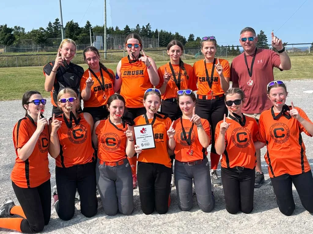  Members of the Southern Shore Crush U17 girls’ softball team were named provincial champions after a competitive weekend of softball in Outer Cove. The girls finished third in the round robin tournament and went up against Conception Bay Centre in the semi-finals. The Crush prevailed after a close game that went an extra inning and then met the undefeated Outer Cove in the finals, whom they bested 10-0. Pitcher Kate Dalton was named the team’s Player of the Game. The same Crush team placed second in Women’s Provincials two weeks ago and will compete at the Eastern championships hosted by Portugal Cove-St. Philips on the weekend of August 16. In the back row, from left, are Gracie Doyle, Brooklyn Dicks, Jane O’Driscoll, Paige Pomroy, and coach Colin Chaytor. In the front row, from left, are Jorja Crane, Jane Coady, Alexis Chaytor, Rachel O’Brien, Sophia Penney, Charlotte Penney, and Kate Dalton. Submitted photo 