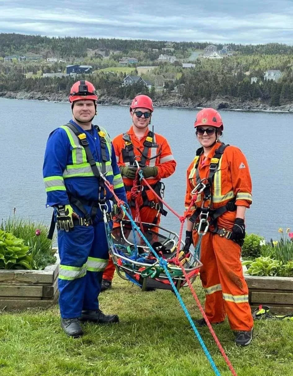  From left, Witless Bay Fire Chief Jack Gatherall, firefighter Josh Glynn and firefighter Stephanie Croft get ready to perform a rope rescue training exercise. Witless Bay Volunteer Fire Department  photo 