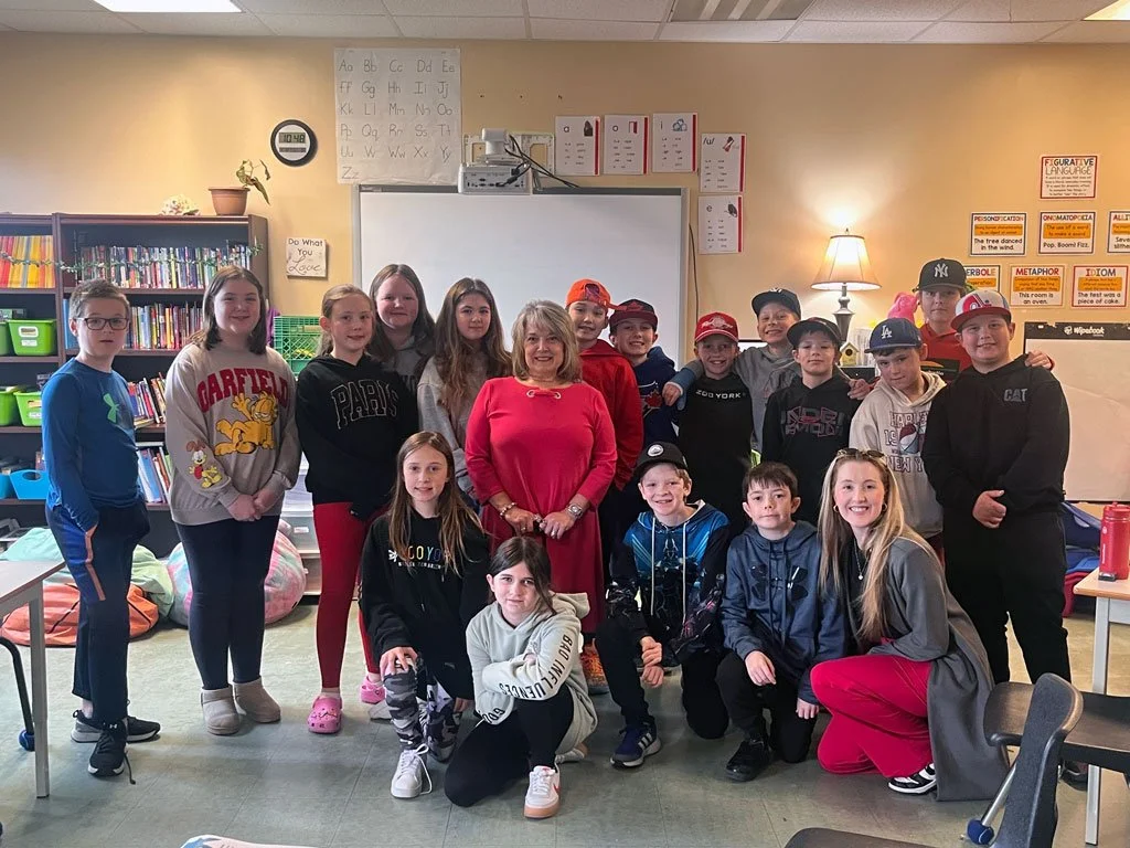  Ms. Erin Etchegary’s Grade 5 Goulds Elementary class helped Seniors Advocate Susan Walsh launch a new provincial contest to celebrate senior’s month earlier this month. In the back, from left, are Alexander Burgess, Alyssa Vincent, Laci Clarke, Hannah Kennedy, Isabella Callahan, Seniors Advocate Susan Walsh, Kurtis Fitzgerald, Parker Galway, Elliot Putt, Nathan Chubbs, Lennon Barbour, Preston Milley, Chase Boland, and Kane Snow. In front, from left, are Kiera Lynch, Marissa Lee, Benjamin Madden, Ethan Raymond, and Seniors Advocate representative Gabrielle Dupont. Missing from photo are Ireland Raymond and Lily Perry. Goulds Elementary photo 