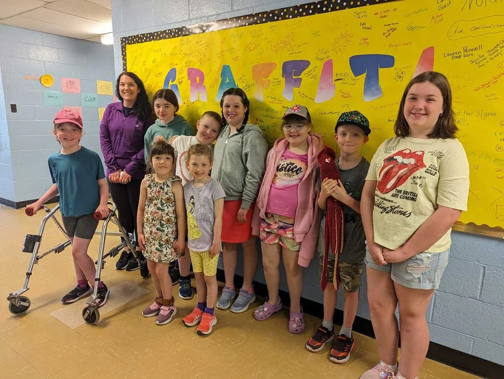  The Goulds Lions Club hosted a reading contest from June 7 to the June 13 open to all Goulds Elementary students. Parents were encouraged to share photos on social media of their children reading for a chance to win one of ten $20 Chapters gift cards. In front, from left are Valerie Byrne, Hadley Weir, and Jayne Fitzpatrick. In back, from left is Goulds Elementary teacher Krista Finn, Sarah Jane Cull, Owen Bennett, Olivia Bennett, Hailey White, Blake Byrne, and Alyssa Vincent. Submitted photo 