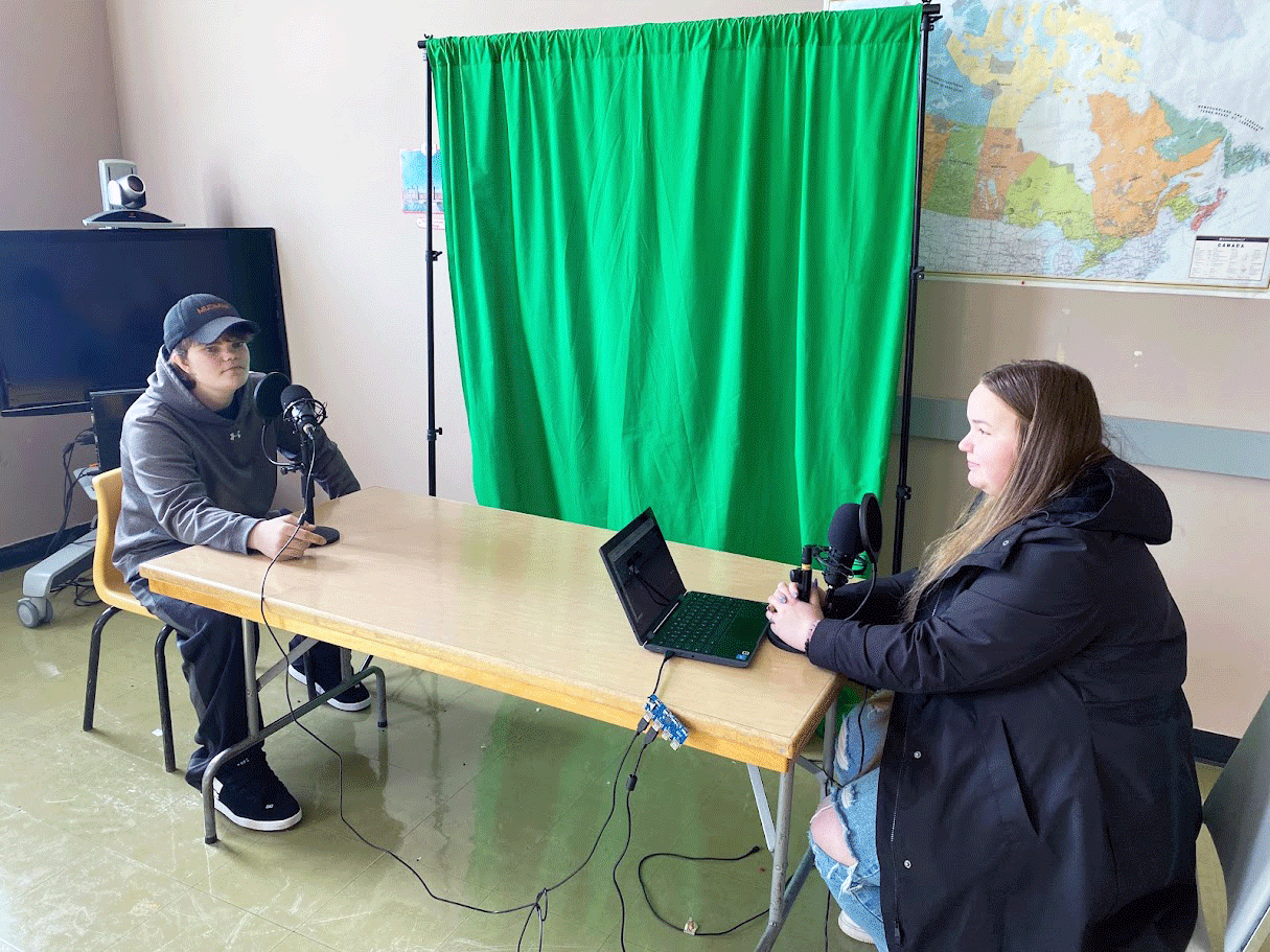   Sarah Cave interviews fellow Stella Maris Academy student Daniel O'Brien about his musical pursuits and talents for the Mystic Radio podcast. Among Cave’s other interview subjects are Shanneyganock frontman Chris Andrews. Submitted photo  