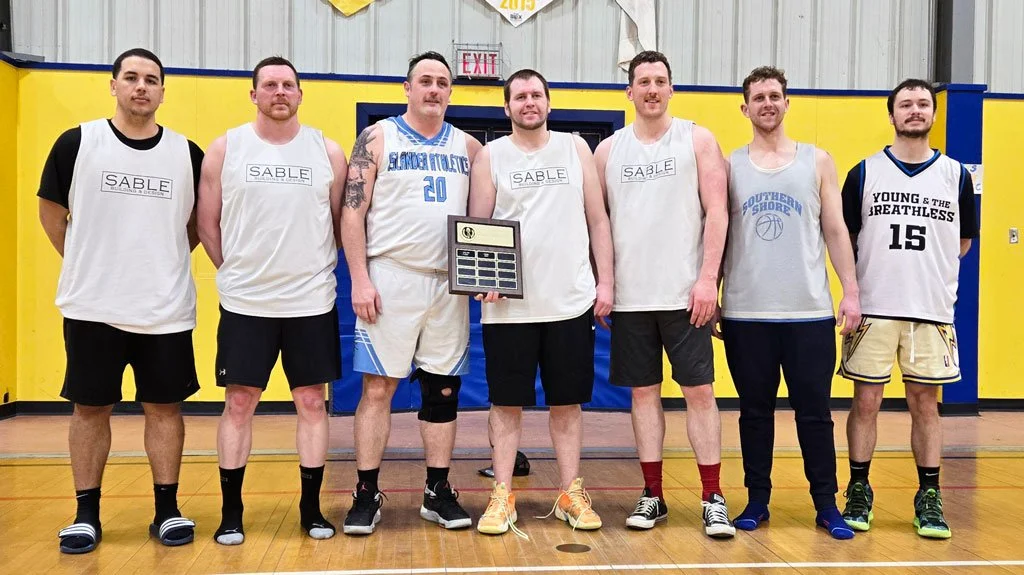  Stella Maris Academy hosted the 24th annual Art Hicks Memorial Basketball Tournament this past week. Between team registrations, door prizes, and 50/50 ticket sales, organizers raised just over $2,000 for the school’s sport program.  The family of the late Art Hicks made a financial donation and also donated a number of team hats, while members of the Trepassey 50 plus club volunteered to cover the door all weekend. Five teams participated and Sable Contracting nabbed tournament gold. Plans for the 25th annual tournament are already underway. From left to right are Kyle Collins, Trevor Ivany, Brant Williams, CJ Clowe, Conor McCarthy, Nathan Mulcahy, and Noah Power. It was the first time in some years that the tournament was held. Hicks was a respected businessman in Trepassey who operated a hardware supply business and was a big supporter of the community’s sports teams. 