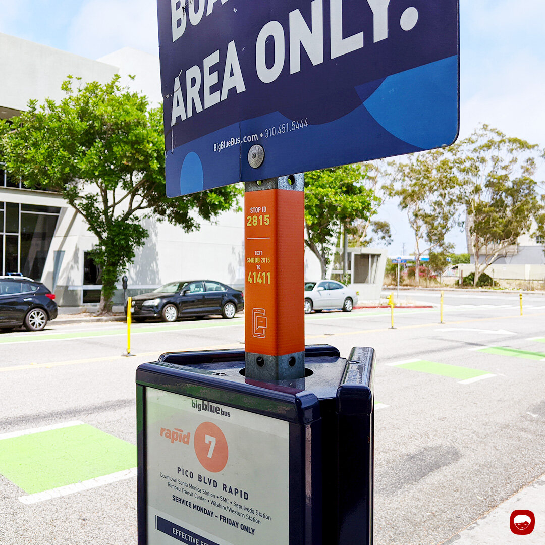 campaign - swiftly - bus stop sign - pole wrap