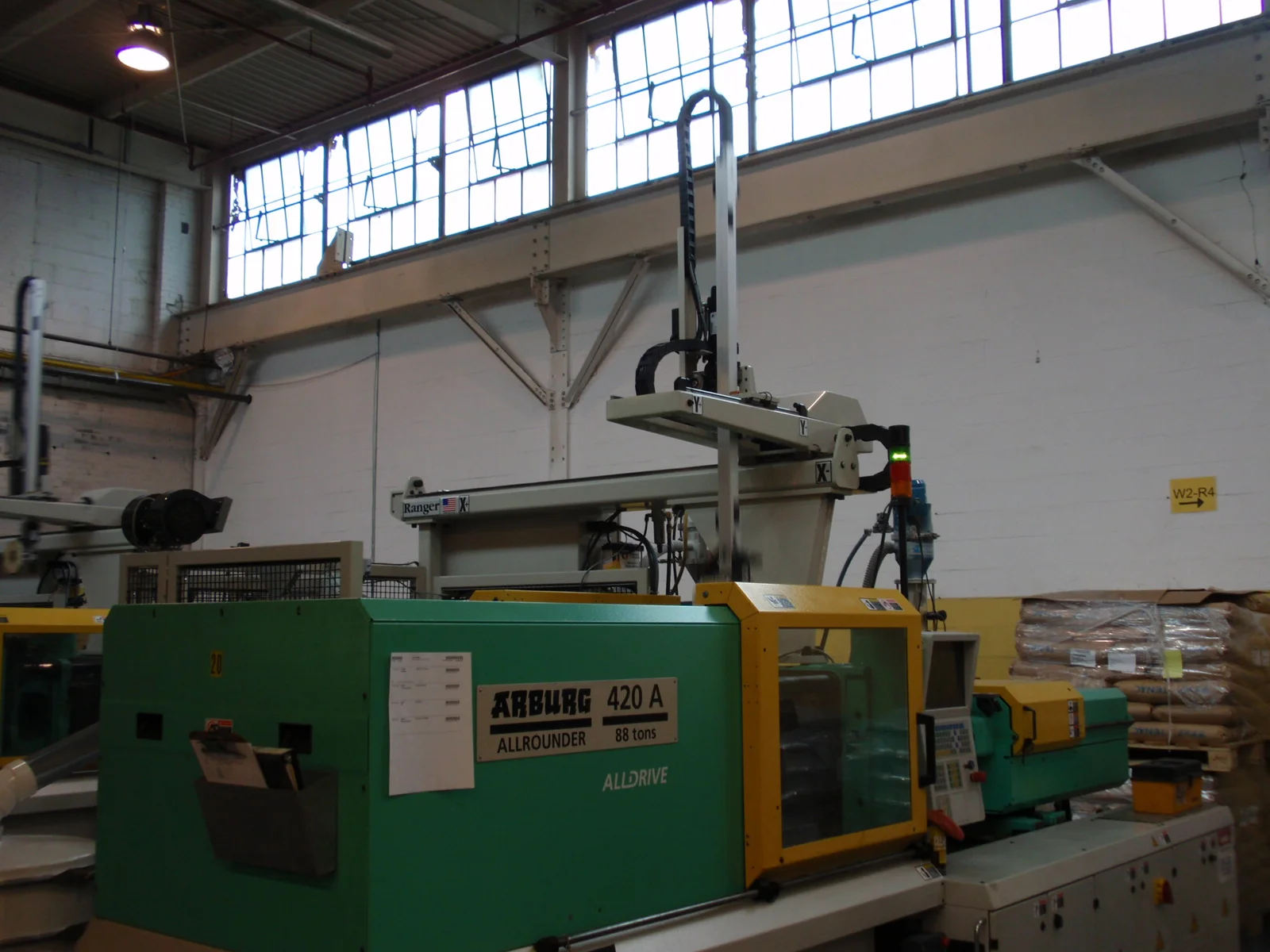 RT-100S3 Robot on Arburg Machine.JPG