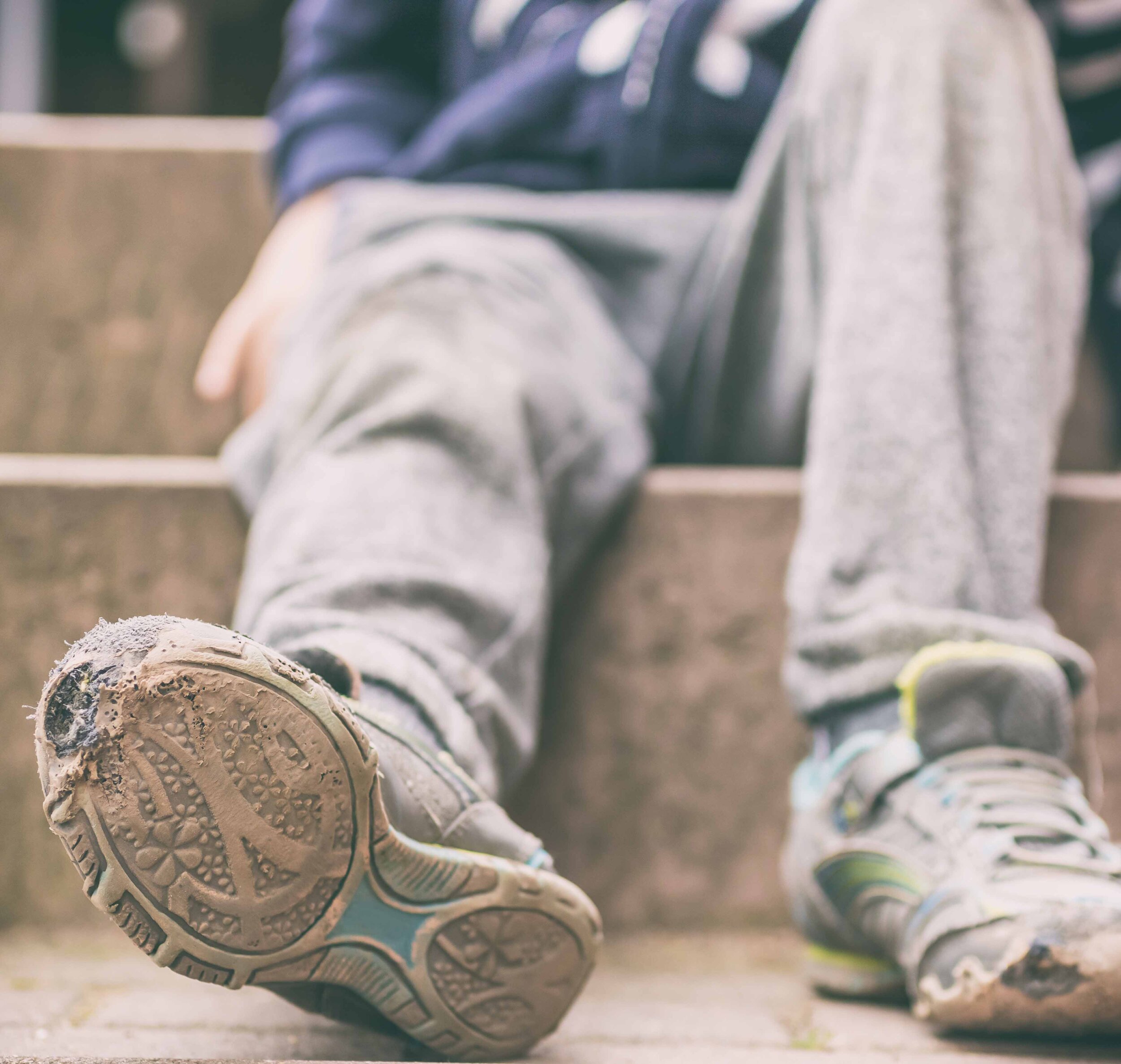 Boy with holes in shoes pic 2.jpg