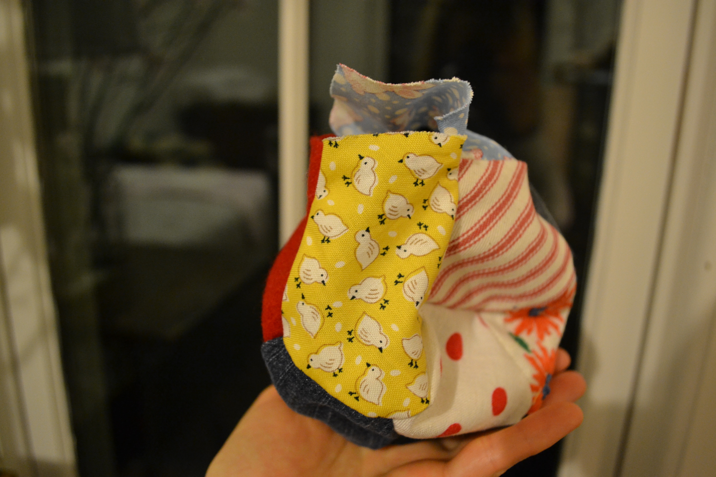 stuffing the ball (I used some wool roving)
