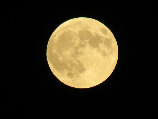 The moon as it rose Sunday night.