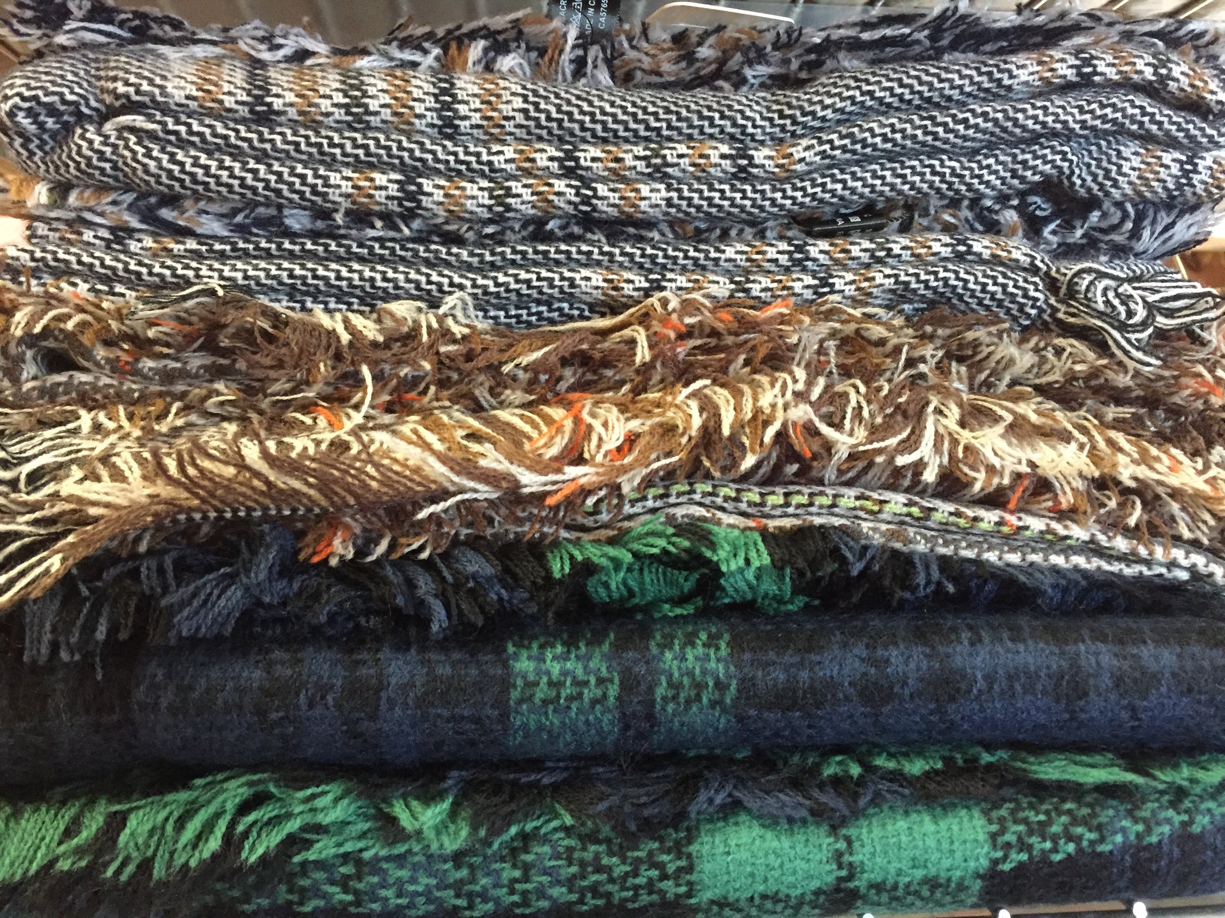 Just a sample of some of our current selection of blanket scarves!