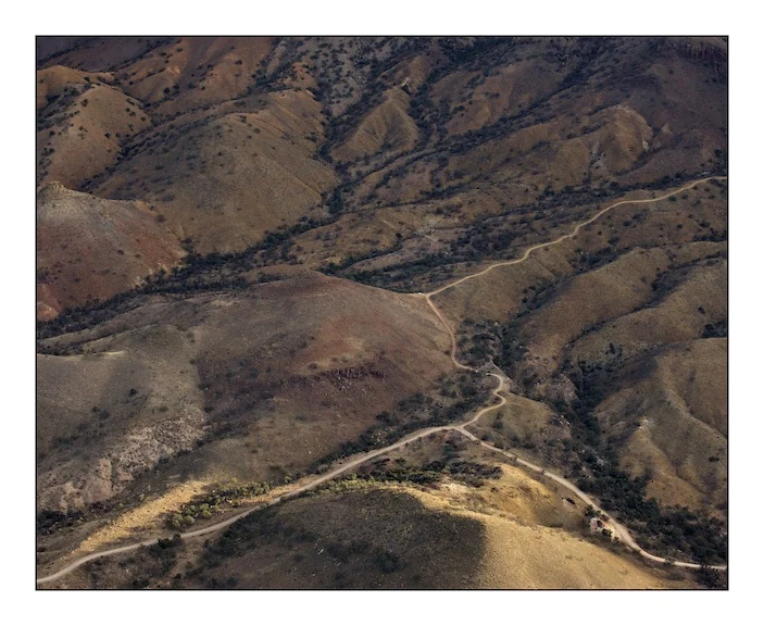 A solitary United States Border Patrol vehicle in the Baboquivari Mountains, Southern Arizona.