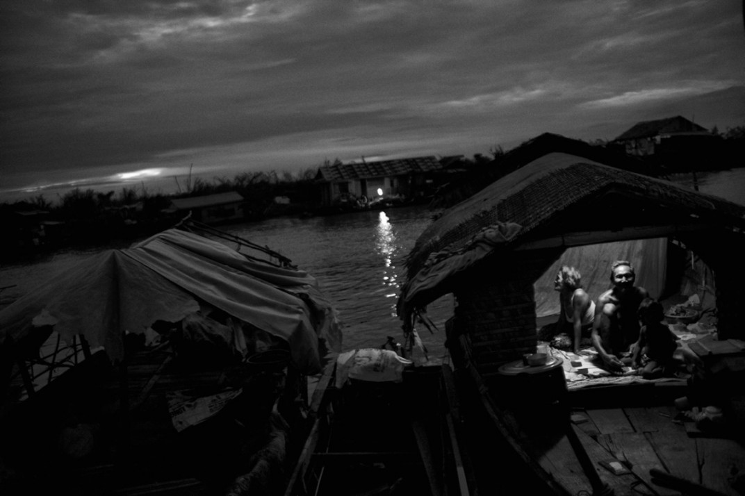 Residents of a floating village, Siem Reap, Cambodia. Photograph by Maciek Nabrdalik of VII Photo Agency who was a workshop student of Gary and Philip in 2009.