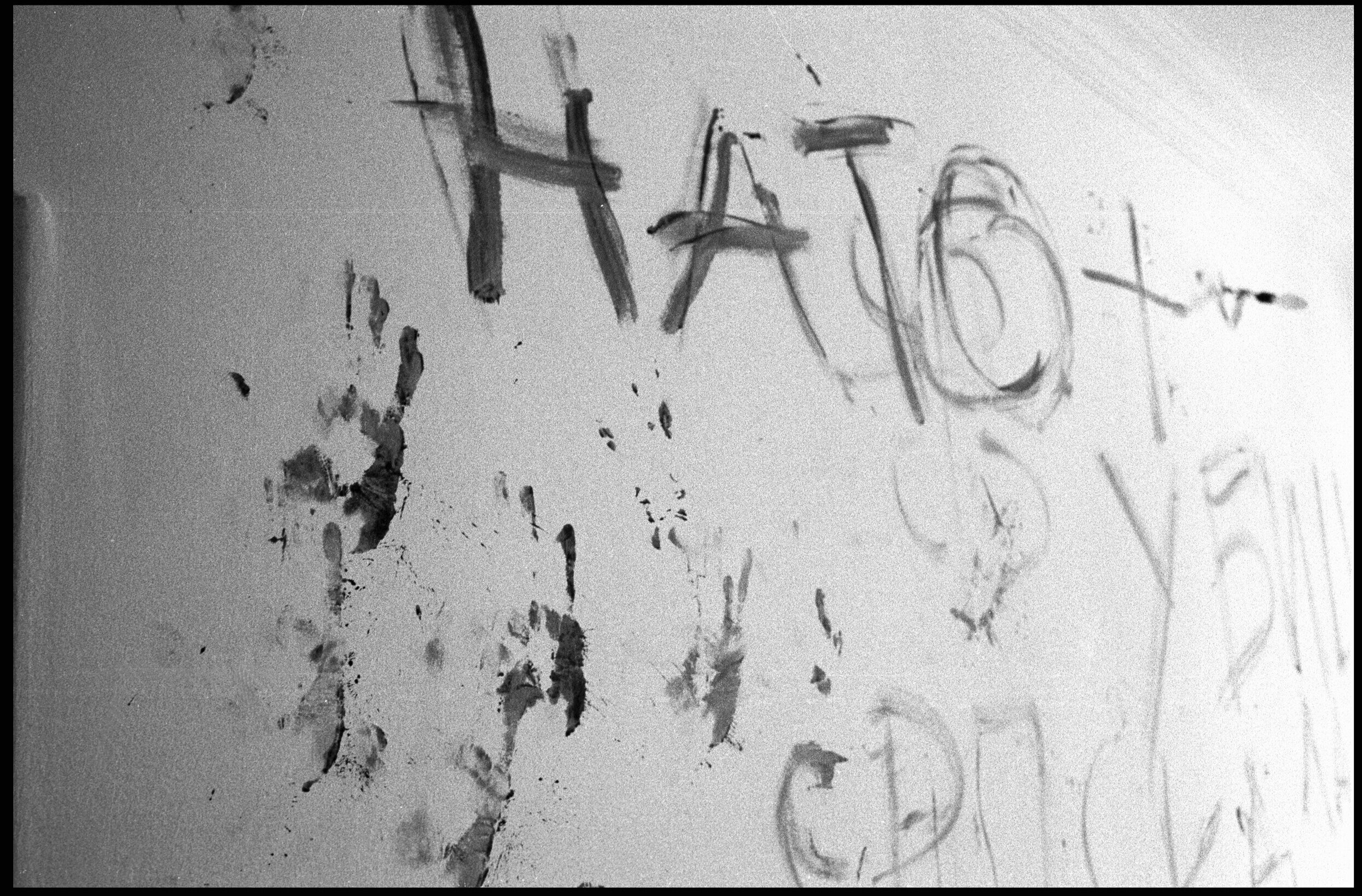  House 19, Kapasnica, Peja. Local residents claim that a Serb paramilitary unit down as  Frankies Boys  tortured and murdered several Kosovar men in this house and wrote messages to NATO in cyrillic with the victims blood. 