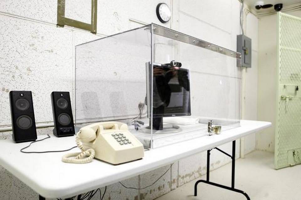This image shows the video monitoring screen used for video-teleconference calls between members of the general detainee population at Guantanamo and their families. Copyright: A Nelson/ICRC