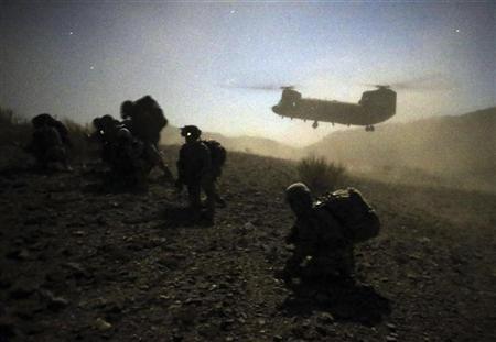 Sarah points to Afghanistan as a situation where the applicable rules changed overnight (when it went from an IAC to a NIAC) even though the character of the conflict did not change. Photo courtesy of Reuters.