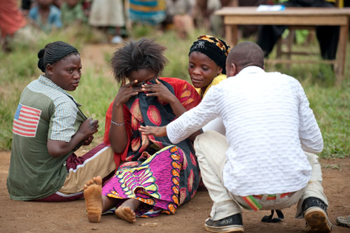 Villagers in Bunyakiri, DRC, perform a play about a woman who has been raped. Such dramatizations help sensitize communities to victims' suffering. © ICRC / P. Yazdi