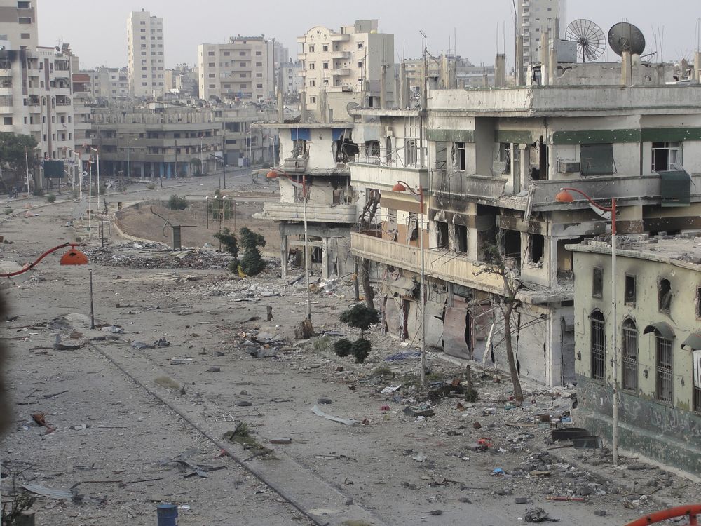 In Syria, delivering assistance to the people of Homs - Photo courtesy of Reuters/Muhammad Al-Ibraheem/Shaam News Network/Handout