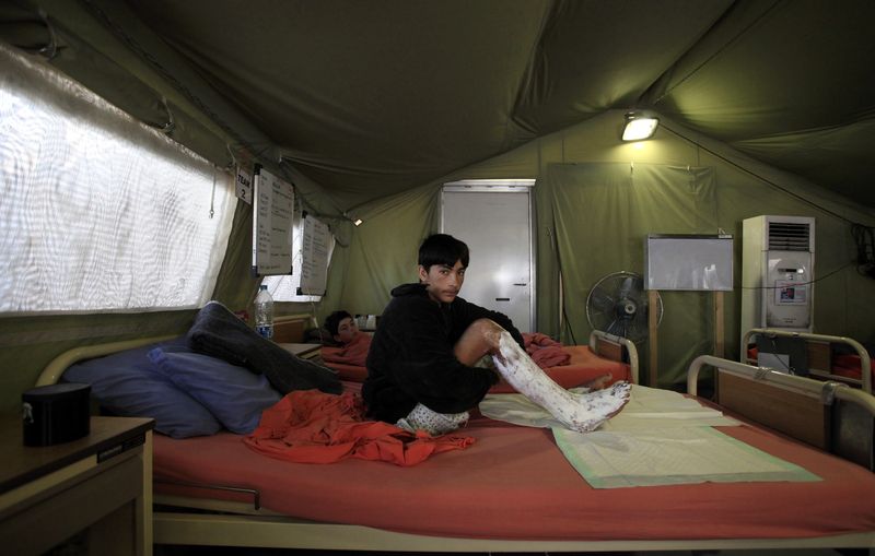 Scaling down operations in Pakistan, but staying - ICRC field hospital, Peshawar, 2011 - Photo courtesy of Reuters
