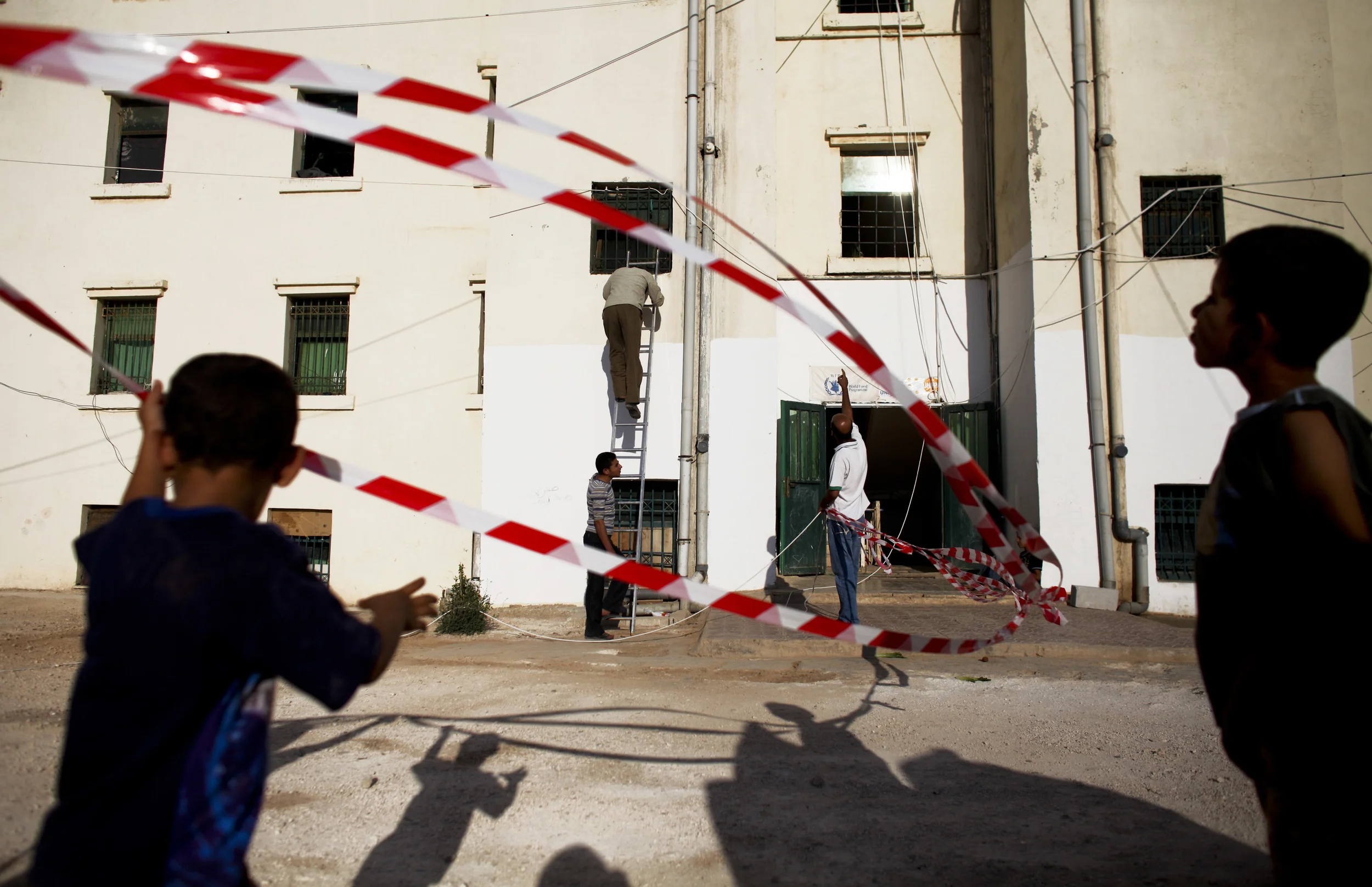 Talking to Syrian refugees in Jordan - Cyber City refugee camp - Photo courtesy of Tara Todras-Whitehil