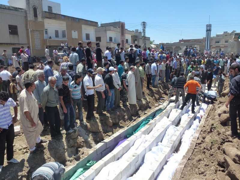 First hand account of the situation in Al Houleh, Syria - Mass burial, May 26/Photo courtesy of Reuters/Handout