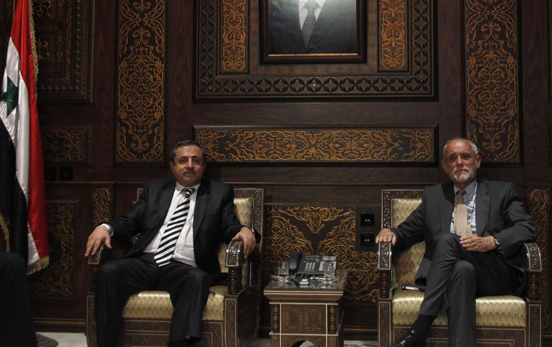 Syrian authorities agree on greater role for ICRC - Interior Minister al-Shaar with President Kellenberger - Photo courtesy of Reuters/Khaled al-Hariri