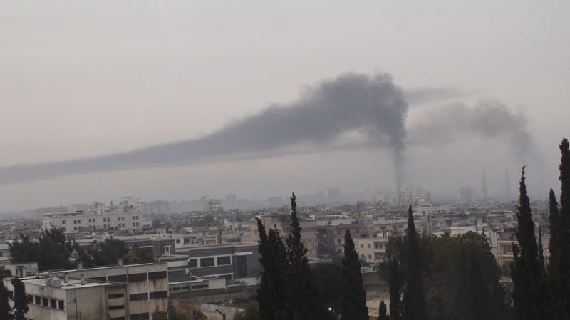Exceptional measures needed to reach Syrian victims - Homs under fire - Photo courtesy of Reuters/Handou